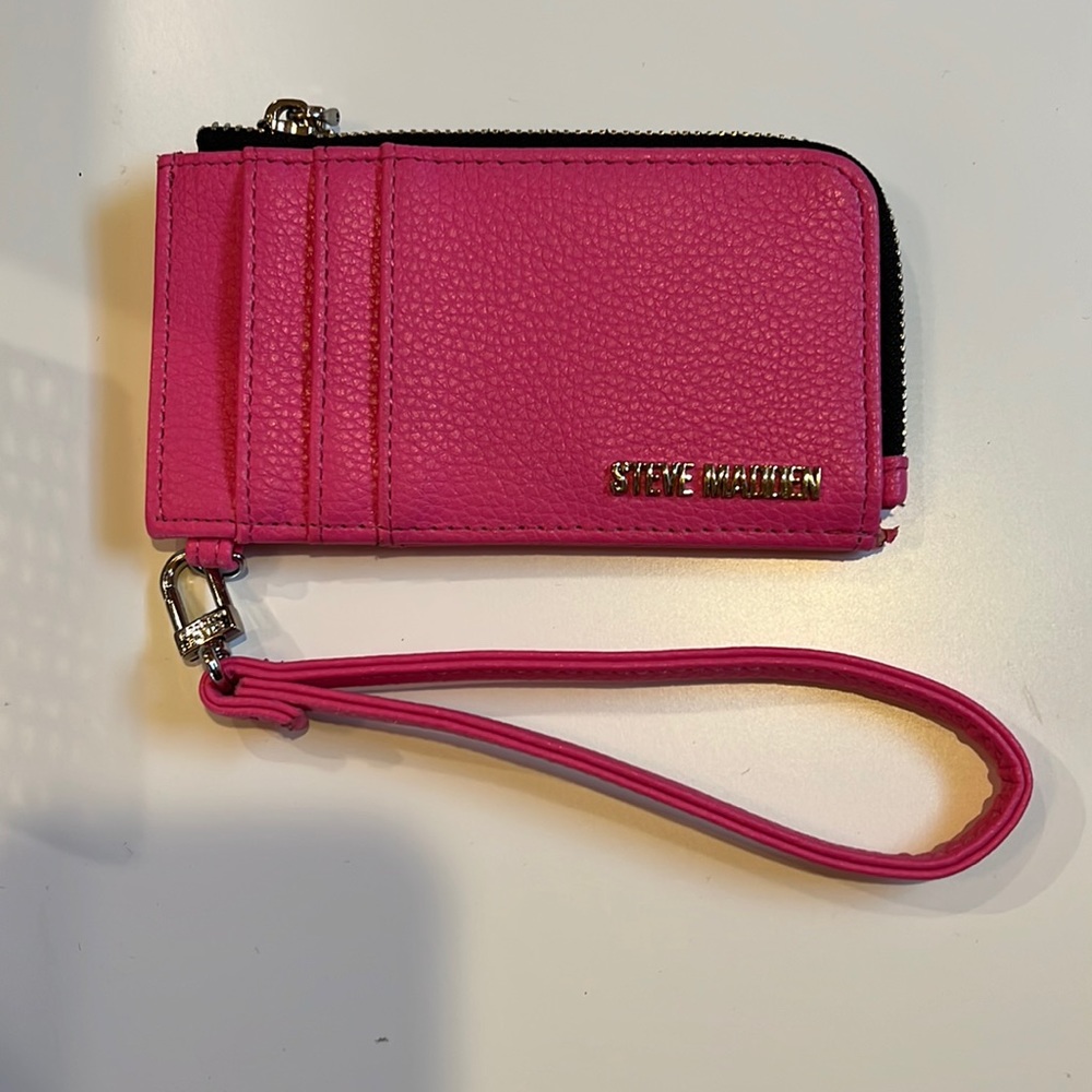 Pink Steve Madden wristlet.